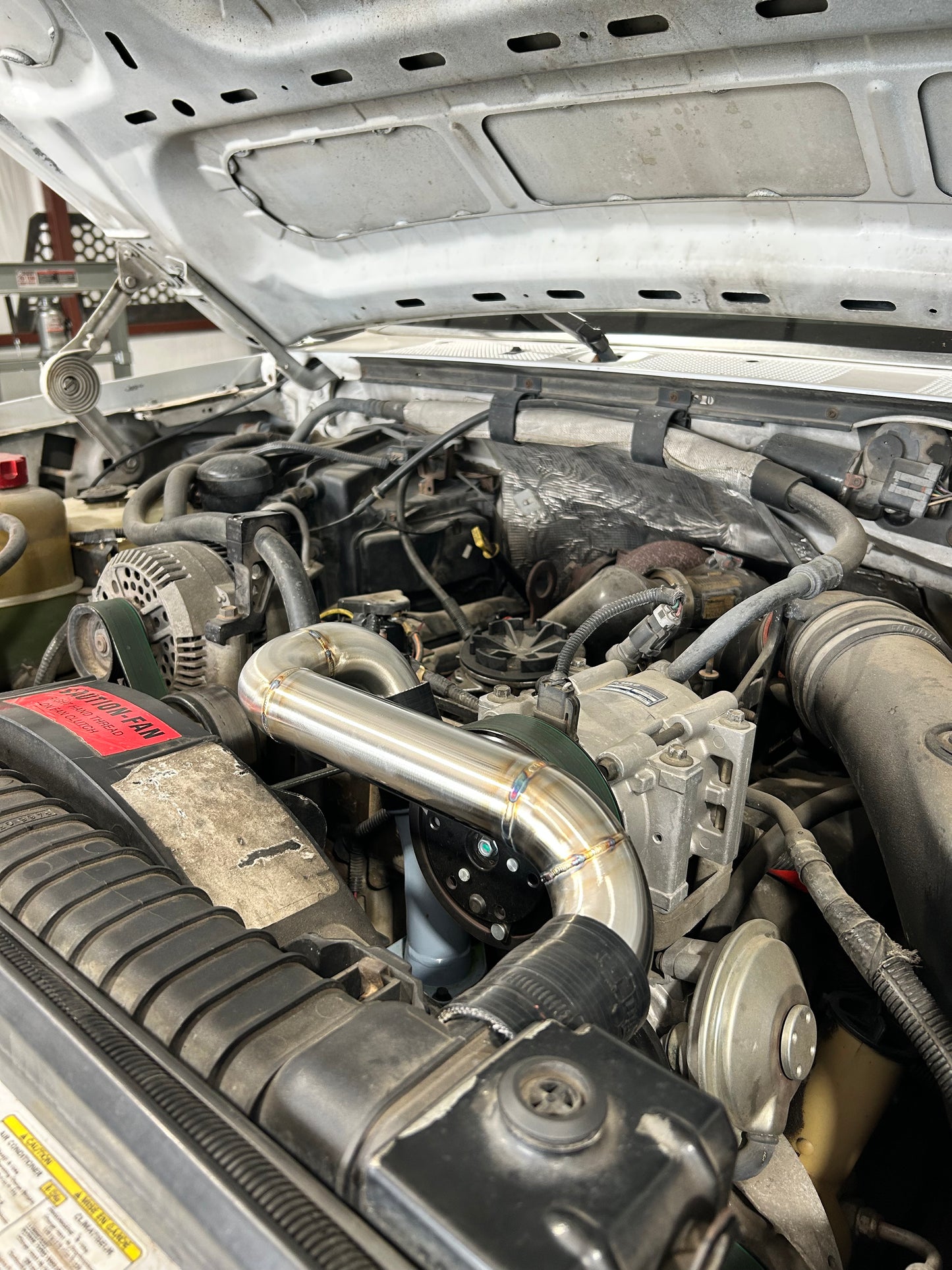 96-97 Stainless Upper Coolant Pipe with OBS Style Coolant Housing