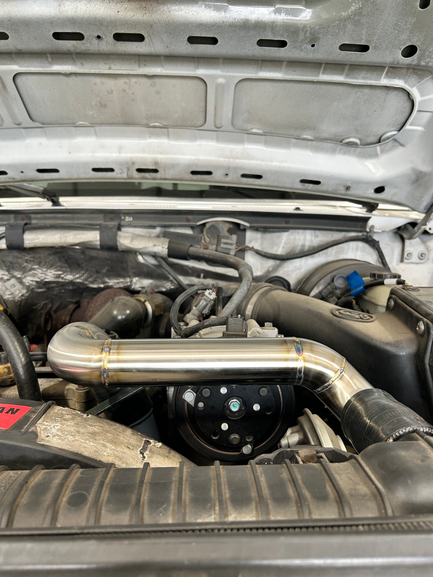 96-97 Stainless Upper Coolant Pipe with OBS Style Coolant Housing